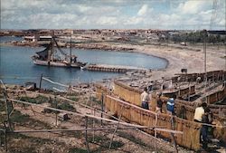 Dhekelia Base. Fishing boats and nets with Housing Areas in the background. Postcard