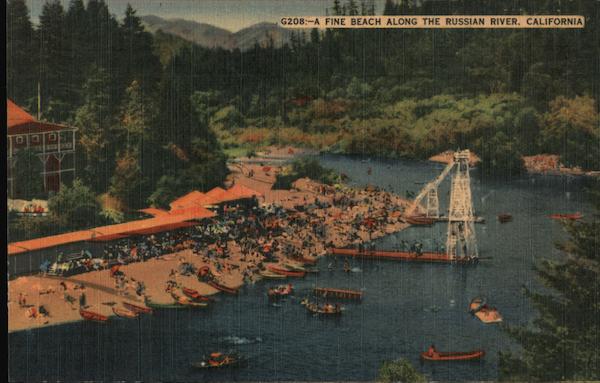 A fine beach along the Russian River. Beach bathers, canoes, river bend Guerneville California