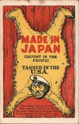 Made in Japan. Caught in the Pacific. Tanned in the U.S.A. Here hangs the pelt of a Jap. Postcard