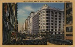 Looking west on Seventh Street at Hill. Trolley, Warner Bros building Postcard