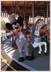 Mickey Mouse on a carousel wearing a suit and top hat Postcard