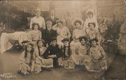 Posed group photo, fifteen adults, late 19th or early 20th century Postcard
