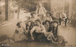 Belle of Boston No. 2: seven women and a smiling man posing Postcard