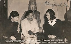 Anna May Wong and ella Raines of "Impact" chatting with Chingwah Lee, Technical Consultant, in his studio Movie and Television A Postcard