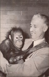 Tanga the Orangutan with Chilcago Lincoln Park Zoo director R. Marlin Perkins Postcard
