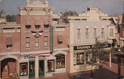 Corner of Main and Center Streets Disneyland. Upjohn Pharmacy Postcard