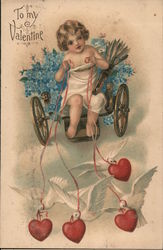 To My Valentine. Cupid driving flower cart drawn by doves with hearts. Postcard