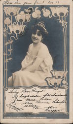 Lightly dressed woman, sitting Postcard