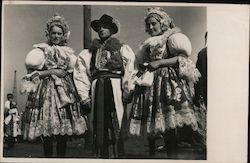 Man and Women in Native Costumes Postcard