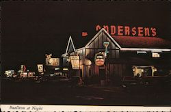 Andersen's at night Postcard