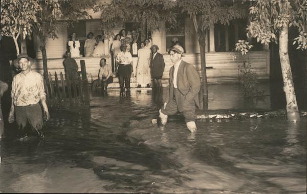 Flooded Homestead Unidentified People