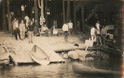 Boat Ramp with rowboat, canoe, swimmers, and spectators, 1928 Postcard