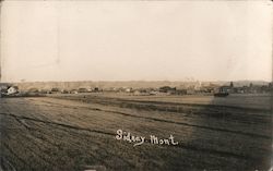 Small town Sidney MT Postcard