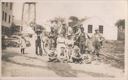 Group of People in dirt Street Postcard