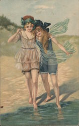 Two Girls Dipping Toes in the Water along Beach near Dunes. Postcard