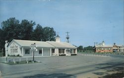 Coach and Four Restaurant, U.S. 41A South City Limits at Chesmotel Lodge Postcard