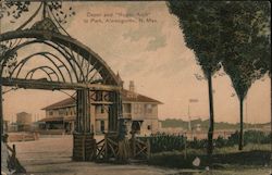 Depot and "Rustic Arch" to Park Postcard