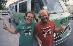 Ben Cohen (right) and Jerry Greenfield prior to departing on their cross-country scoopathon in the company's Cowmobile. Advertis Postcard