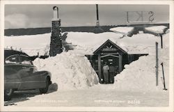 Hilltop Lodge Covered in Snow Postcard