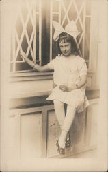 Girl at Parlor Window Postcard
