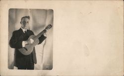 Young Man with Guitar Postcard
