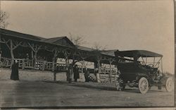 People, Touring Car at Rustic Lodge Postcard