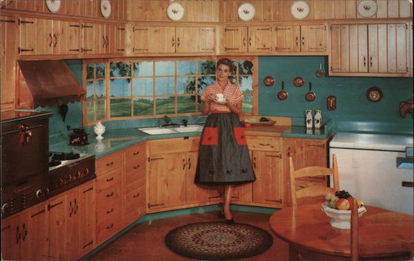 The Wood Mode custom designed kitchen being enjoyed by a woman having coffee