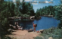 Beach View - People Canoeing Eagle River, WI Postcard Postcard Postcard