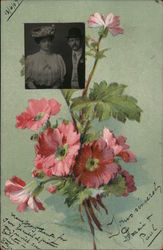 mint green card with a picture of a man and a woman and a bouquet of pink flowers Postcard
