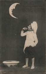 Boy dressed as a Chef looking at an angry Moon Postcard