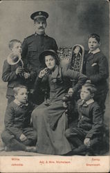 Adj. & Mrs. Nicholson, Willie, Johnnie, Perc, Bramwell. Family Portrait with Brass Instruments Postcard