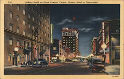 Looking South on Stone Avenue, Pioneer Hotel in Foreground Postcard