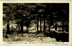 Looking Toward The Beach And Docks Of Camp Idlewild Lakeport Tuftonboro, NH Postcard Postcard