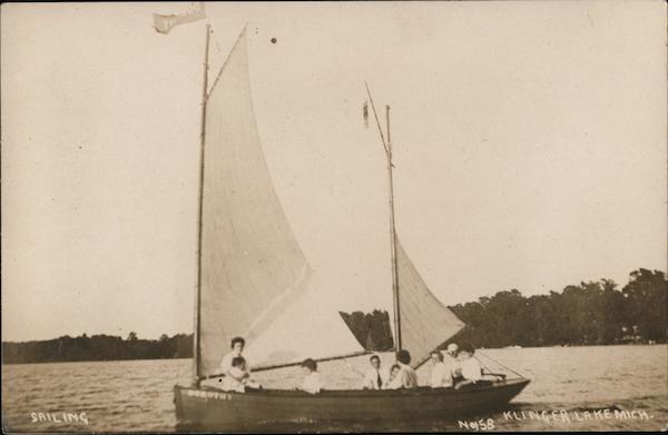 Sailing Family in Sailboat Klinger Lake Michigan