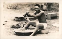 Food preparation traditional way in big bowl with mortar Postcard