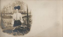 Woman in Victorian dress posing with Alligator Postcard