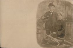 Man and Woman with Alligators Postcard