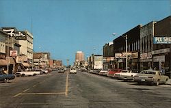 Ludington Street Looking East With 18 Story Harbor Tower in Distance Postcard