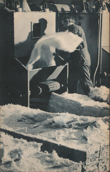 New England's Textile Industry - Cotton from Bales put through opening machine