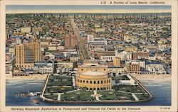 Municipal Auditorium in Foreground and Famous Oil Fields in the Distance Postcard