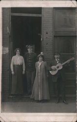 Men and Women Standing With Guitar Postcard