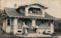 Family on Porch of Large Craftsman Home Postcard