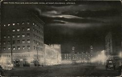 Pikes Peak Ave and Antlers Hotel at Night Postcard