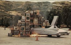 Phantom Dream Car Crashing Through Burning TVs Postcard