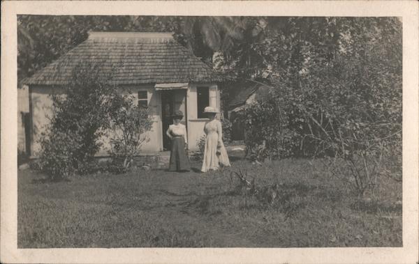 Two Women Outside a Residence Jamaica