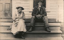 Couple Sitting on Porch Steps Postcard