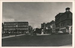 View of City in Evening Postcard