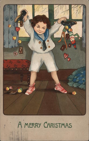 Child Dumping Toys Out Of His Shoes A Merry Christmas