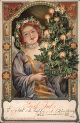 Angel holding Christmas tree lit with candles Postcard