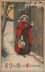 A Very Merry Christmas - girl in snowy outdoor scene, carrying basket to the door Postcard